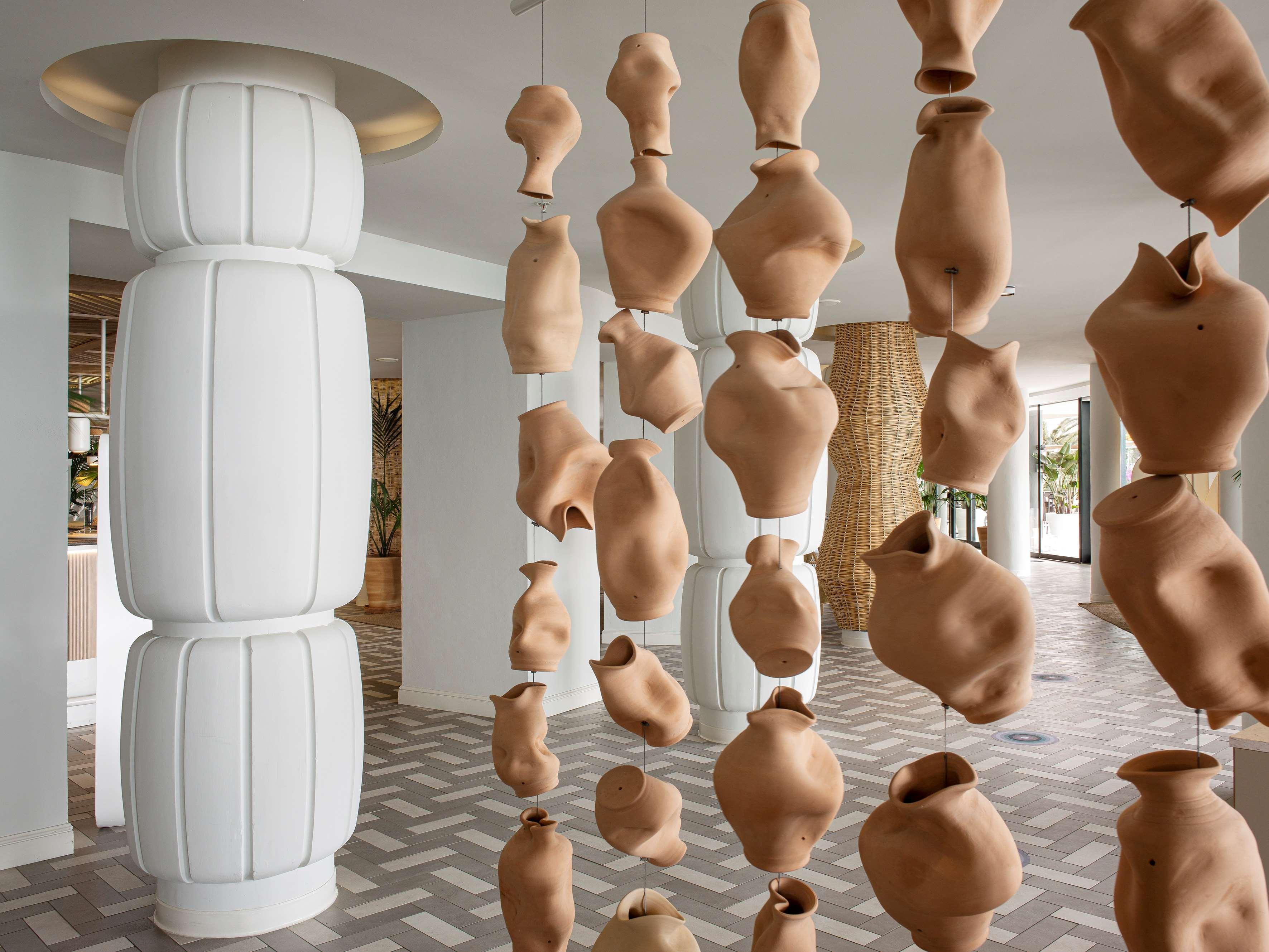 Hotel Me Sitges Terramar Esterno foto Installation of the work "The 1000 Faces of the Sun" at the Hotel The Standard, East Village, New York City, 2015